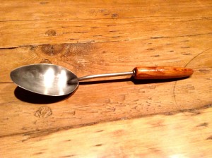 A friend needed a new handle for a favorite spoon. I found a piece cut off a tree in our yard ands turned it on the lathe,